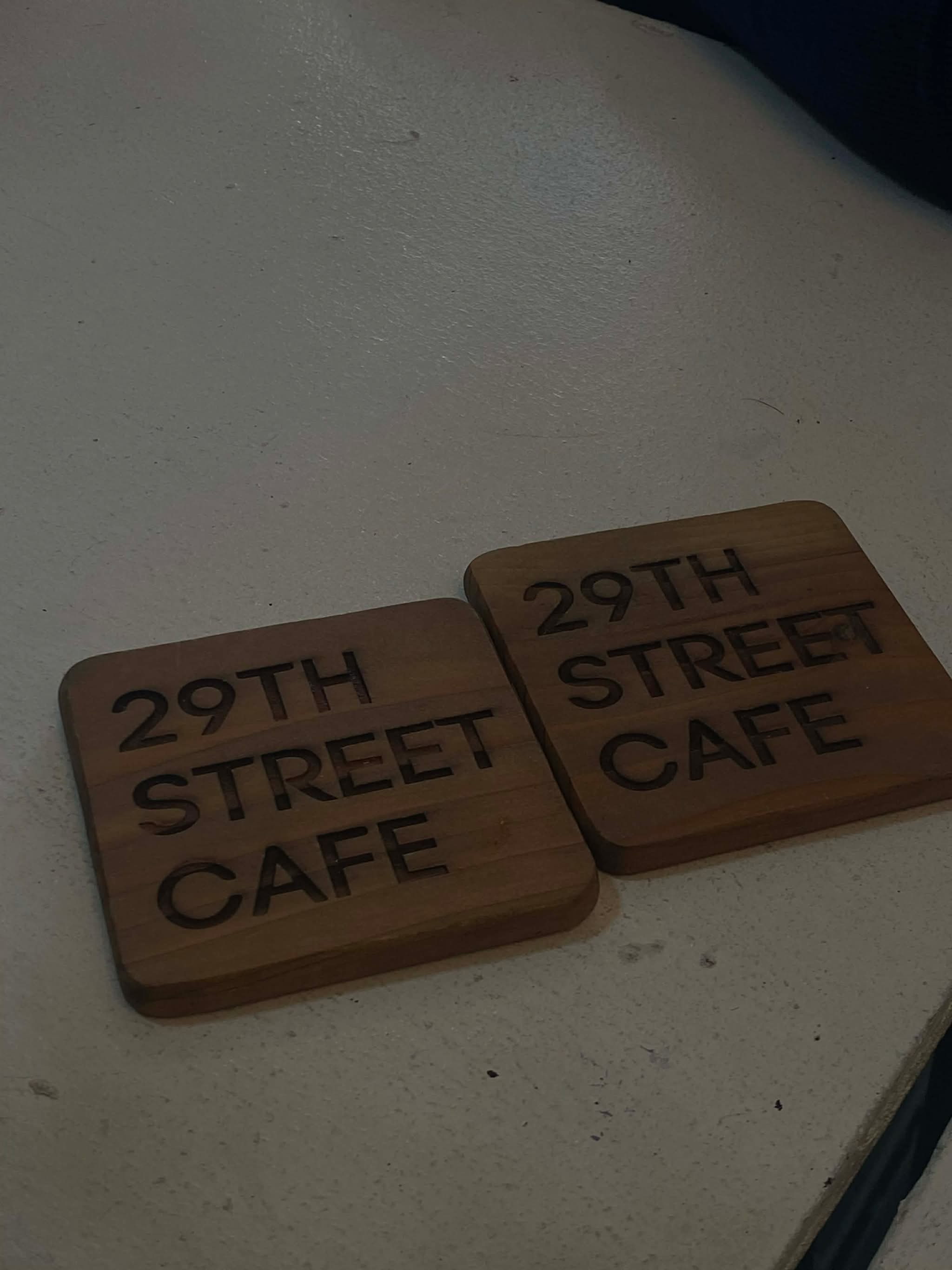 Freshly roasted brown coffee beans representing the ZUS Coffee quality promise